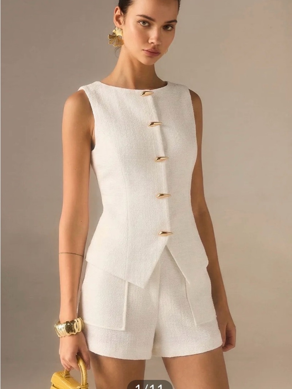 Commense White Sleeveless Textured Romper with Gold Buttons